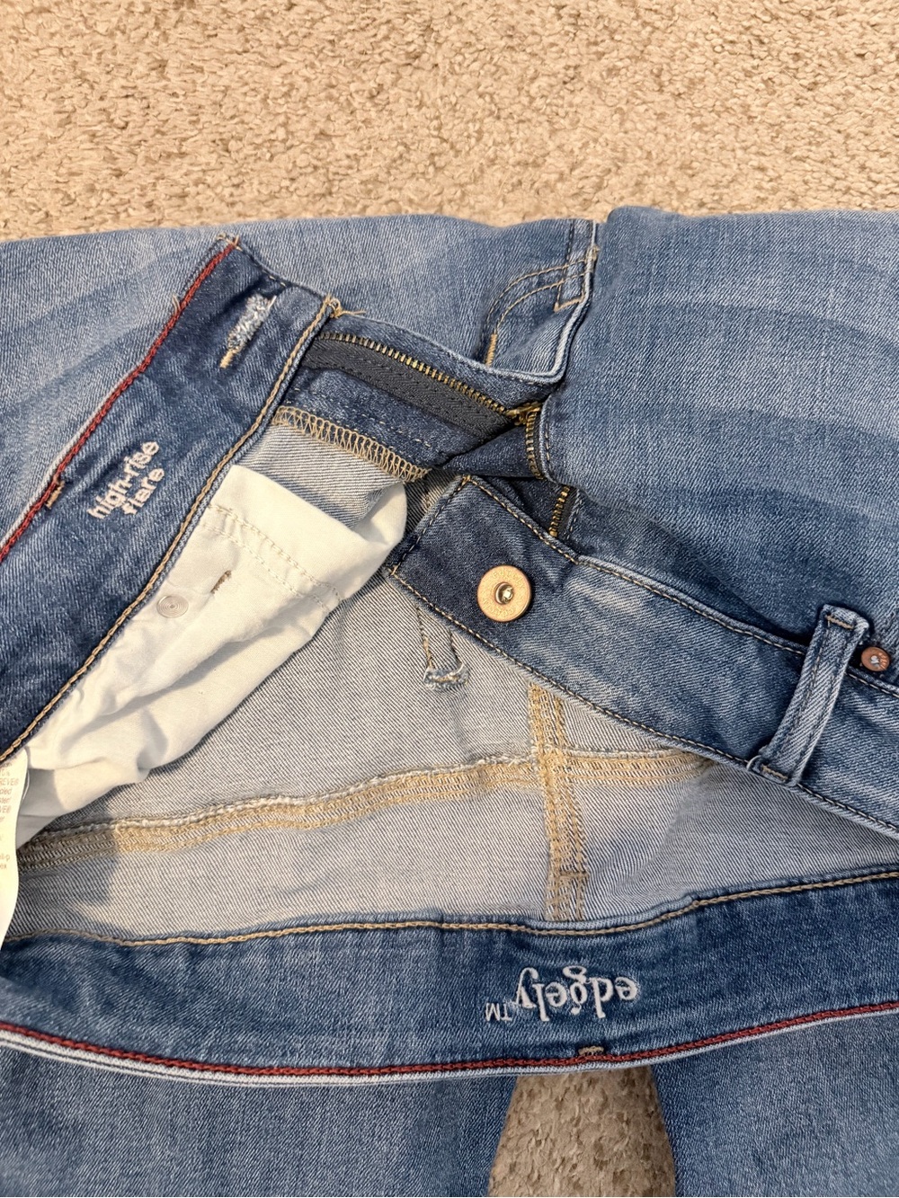 Women’s Light Wash Flare Jeans by Adelyn (Blue)